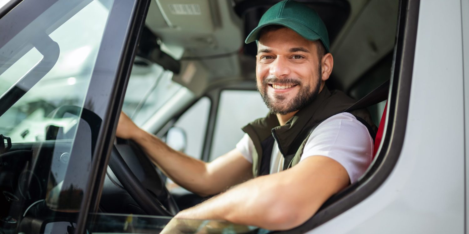 Young,Handsome,Man,Working,In,Towing,Service,And,Driving,His